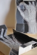 Title: Gift - detail installation<br>Year: 2013<br>Dimensions: 12 x 9 x 7,5 cm<br> Description: Silk and laser printing on paper